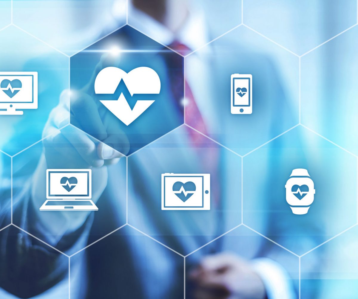 37622734 - businessman pointing towards camera selecting health application, virtual interface